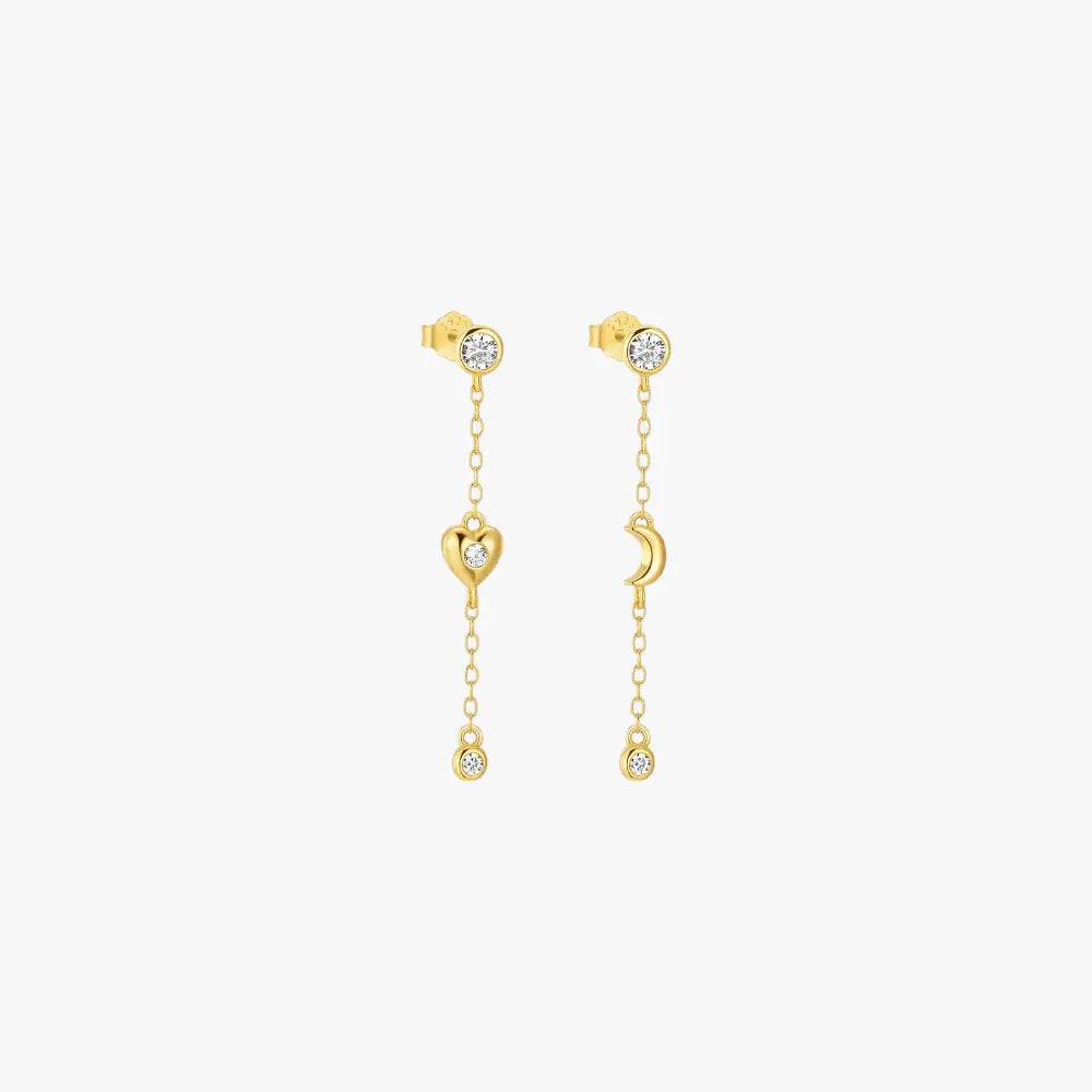 Gold heart and moon dangle earrings with crystal charm for a whimsical and romantic accessory.