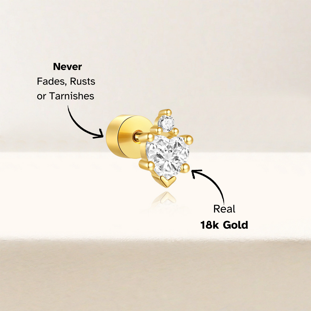 Dainty heart zircon stud earrings in gold-plated silver, ideal for stacking and gifting.