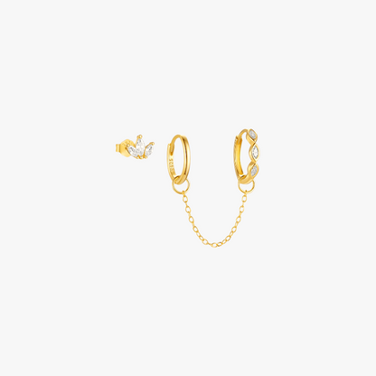 Gold hoop earrings with marquise diamonds and a delicate chain, perfect for a sophisticated look.