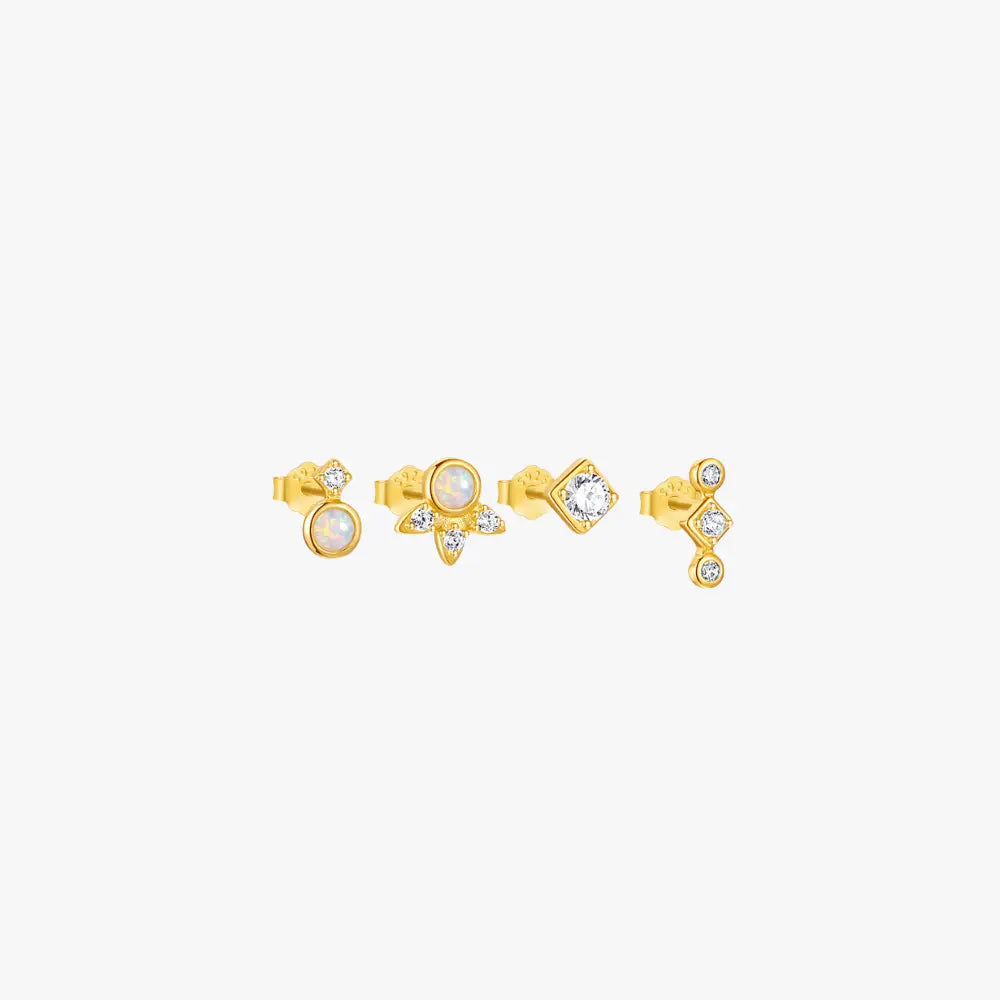 Gold stud set for multiple ear piercings with diamonds and unique shapes