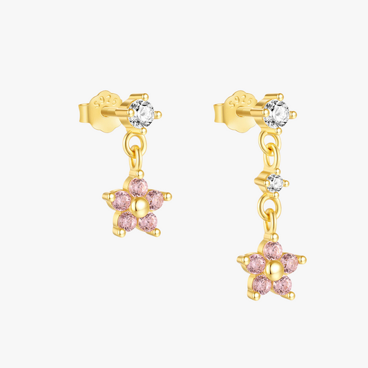 Elegant gold-plated flower drop earrings with pink cubic zirconia petals and crystal accents. A chic and feminine touch for any jewelry collection.