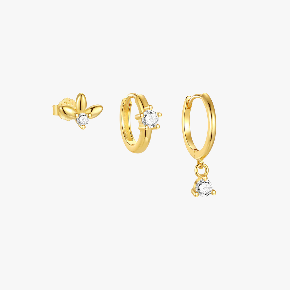 Elegant 925 sterling silver gold-plated trio earrings set featuring a stud, huggie hoop, and dangling zirconia design for a stylish ear stack look.