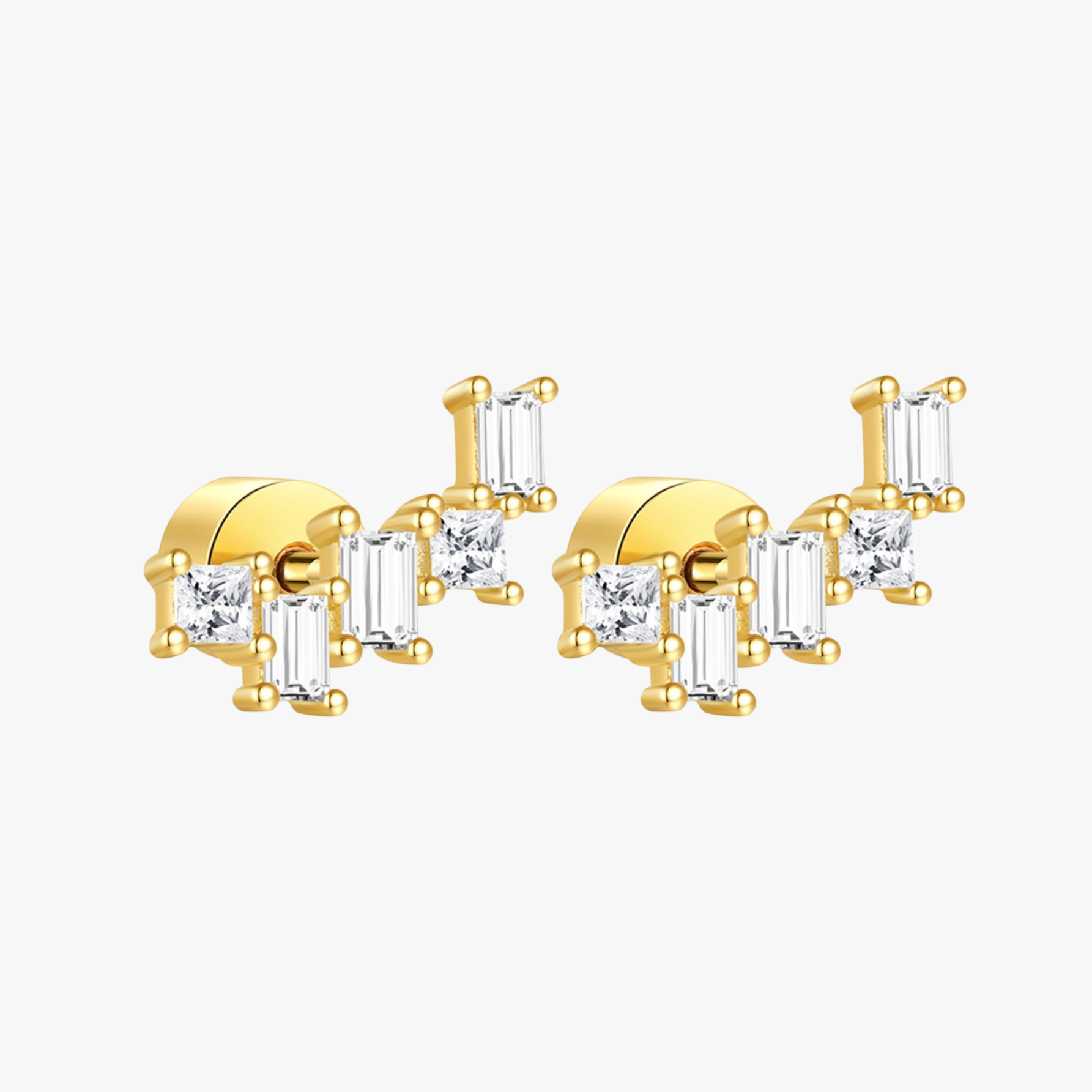 Gold-plated zircon stud earrings with baguette-cut stones, perfect for a chic and modern look.