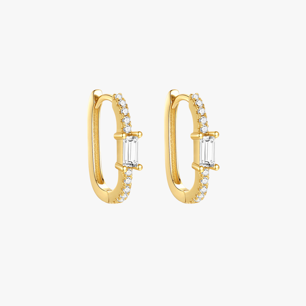 Elegant gold huggie hoop earrings with rectangular cubic zirconia stones, perfect for daily wear or special occasions.