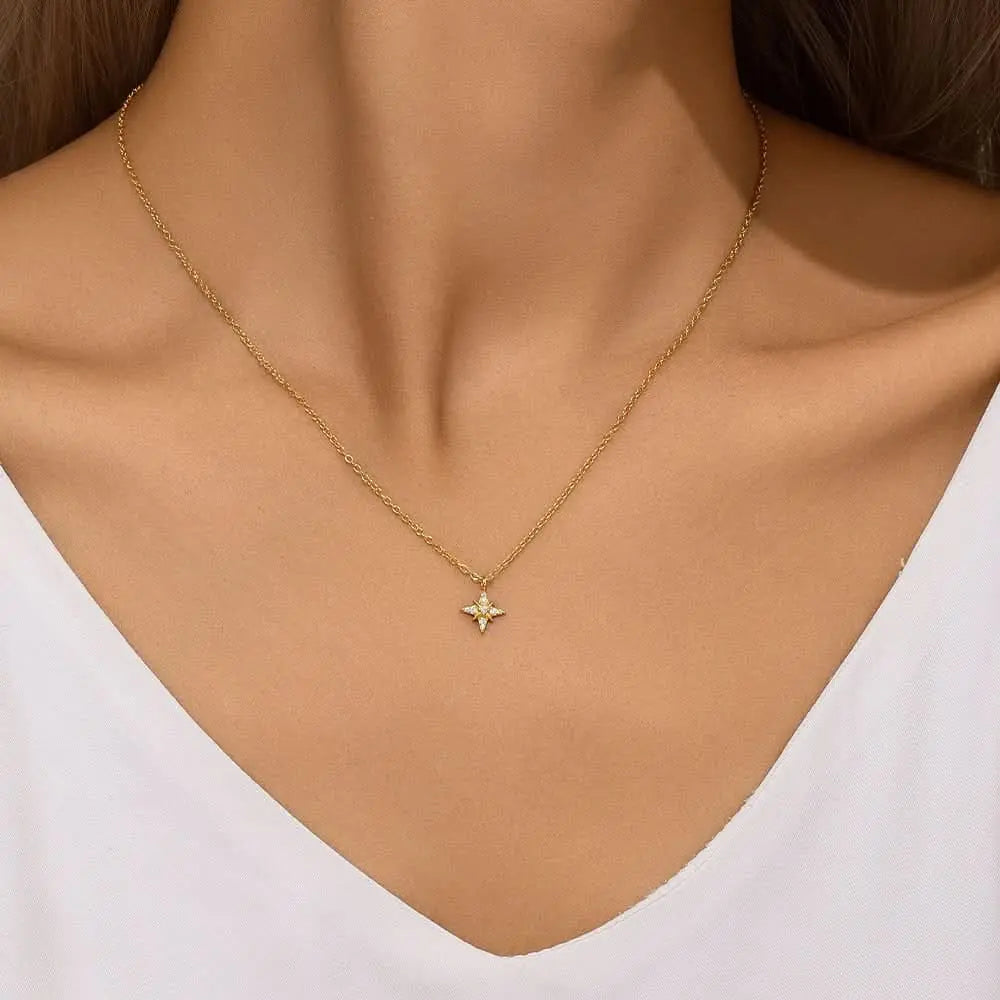 Model wearing a gold star necklace with minimalist design, perfect for everyday wear