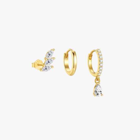 Gold vermeil 925 sterling silver zirconia earrings set – a minimalist trio featuring a leaf stud, a classic huggie hoop, and a dangling teardrop zirconia hoop.