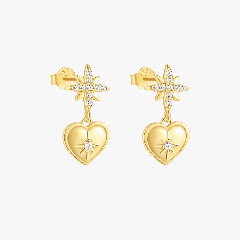 Elegant 925 sterling silver gold-plated heart earrings with a star design and zirconia details. Perfect for adding charm to your look.