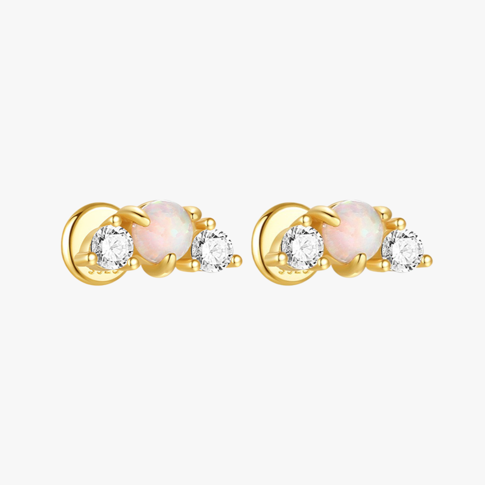 Minimalist opal cartilage earrings in gold, designed for everyday wear.