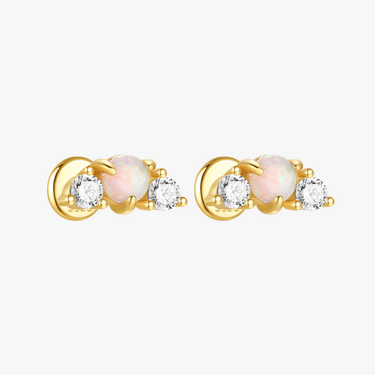 Minimalist opal cartilage earrings in gold, designed for everyday wear.