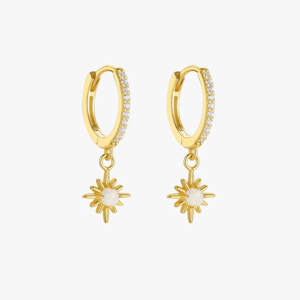 Opal sunburst hoop earrings with sparkling zircon details on white background