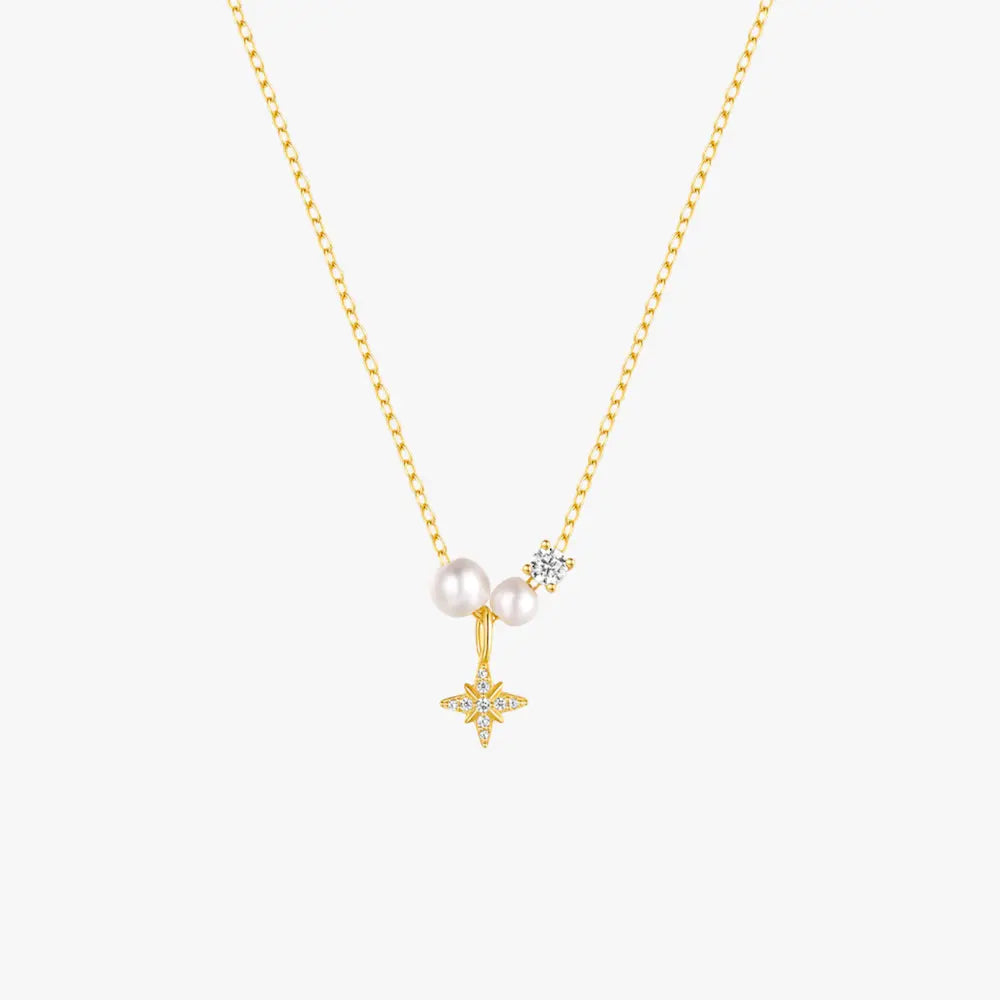 Gold necklace with pearl and star pendant, elegant and minimalist design