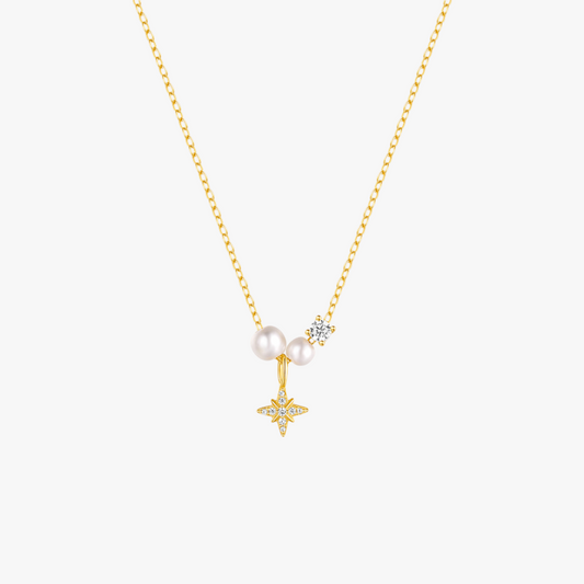 Gold necklace with pearl and star pendant, elegant and minimalist design