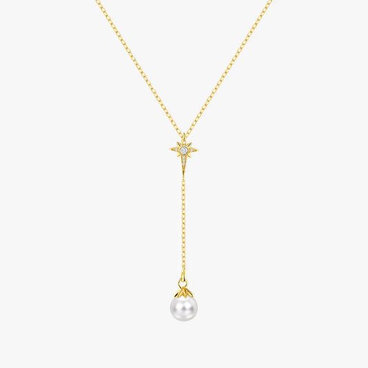 Gold Y-shaped necklace with a delicate star-shaped pendant and a dangling pearl accent, crafted from 925 sterling silver.