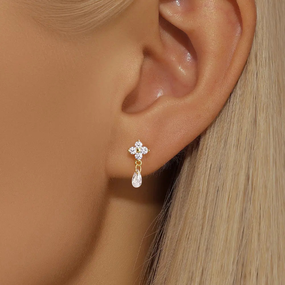 Boucles d'oreilles pendantes élégantes en forme de fleur en zircon