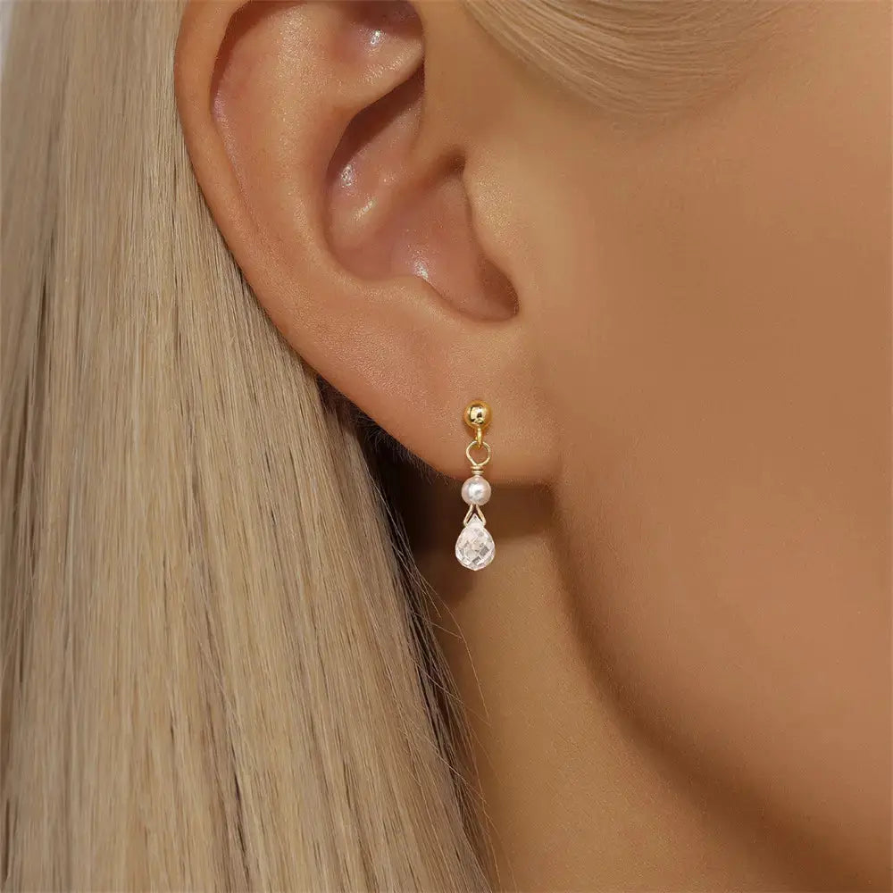 Boucles d'oreilles pendantes en perles et zircons